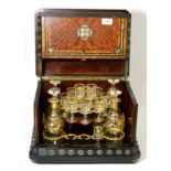 A Victorian mother of pearl inlaid amboyna and an ebonised liqueur cabinet