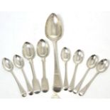 A George III silver spoon and a quantity of silver teaspoons