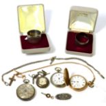 Three various silver watches, a gold plated pocket watch and two silver napkin rings etc (8)