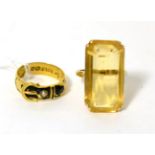 An 18 carat gold black enamel and pearl mourning buckle ring (a.f.), finger size P1/2 and a