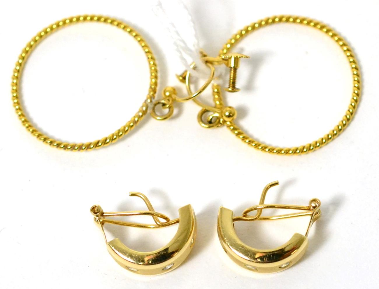 A pair of gem set half hoop earrings, with French clip fittings and a second pair of hoop earrings