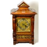 A Victorian walnut quarter striking table clock, movement back plate stamped RMS
