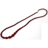 A red bakelite bead necklace43.92g gross