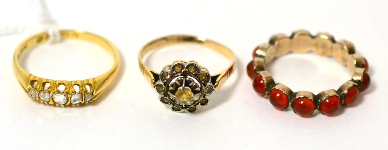 An 18 carat gold rose cut diamond ring, finger size P, a gem set eternity ring, finger size L and