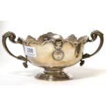 A silver twin handled pedestal bowl with Lytham St Annes Golf Club badge inscribed Singapore Cup