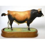 Royal Worcester Jersey Bull ''Leebarn Carlisle II'', model No. RW3776 by Doris Lindner, on wooden