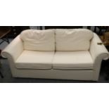 Cream upholstered sofa bed