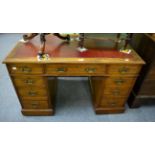 Early 20th century leather inset oak pedestal desk