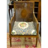 A 19th century bergere armchair