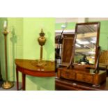 A 19th century mahogany mirror together with a brass columnar standard lamp and similar oil lamp (