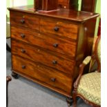 A Victorian mahogany five drawer straight fronted chest of drawers, circa 1860, of two short over