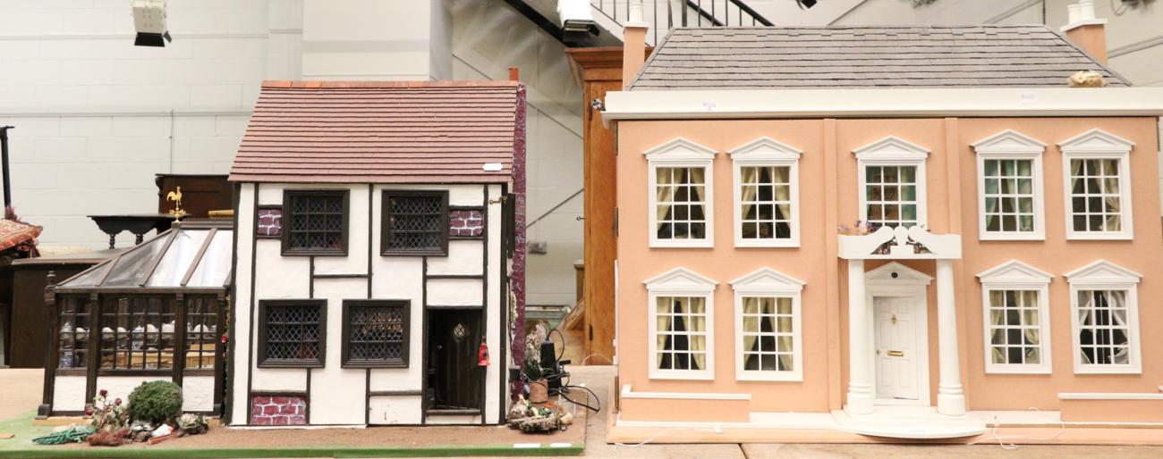 Two modern dolls houses complete with furniture