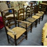 A set of six Lancashire style rush seated chairs including two carvers