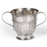 A George III Silver Porringer, maker's mark obscured, London, 1774, with reeded handles on