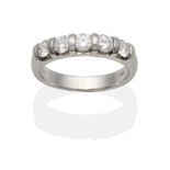 A 9 Carat White Gold Diamond Half Hoop Ring, five round brilliant cut diamonds in bar settings,