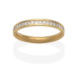 An 18 Carat Gold Diamond Half Hoop Ring, channel set princess cut diamonds, total estimated