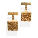 A Pair of 18 Carat Gold Textured Cufflinks, a square head connected to a textured rectangular bar,