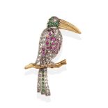 A Diamond, Ruby and Emerald set Toucan Brooch, modelled perched on a branch and set throughout