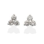 A Pair of 18 Carat White Gold Diamond Trefoil Cluster Earrings, three round brilliant cut diamonds