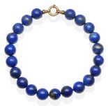 A Lapis Lazuli Necklace, round beads knotted to a bolt ring clasp, length 43.5cm see illustration