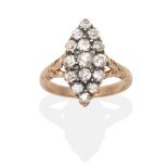 A Diamond Navette Cluster Ring, old cut diamonds in claw settings, to forked scroll shoulders, total