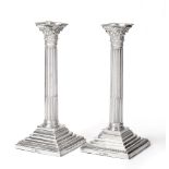 A Pair of Late Victorian Corinthian Column Candlesticks, Charles Boyton, London 1896/97, with bead