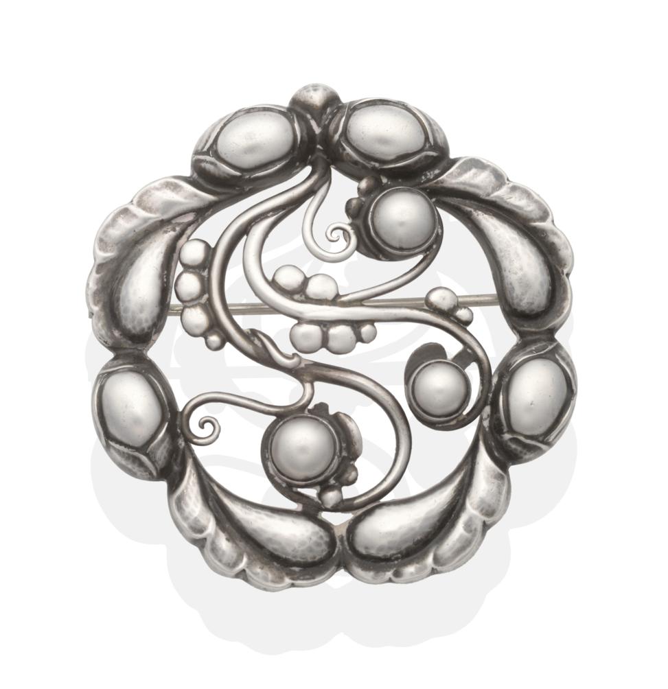 A Silver Georg Jensen 'Moonlight' Brooch, model number 156, of circular openwork form with a