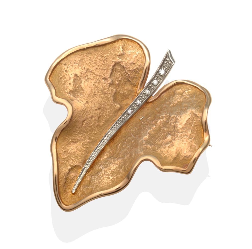 A Diamond Leaf Brooch, an ivy leaf with a brushed finish within a bright polished frame with a