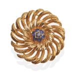 An 18 Carat Gold Sapphire Brooch, a cluster of seven round cut sapphires in claw settings within a