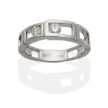 An 18 Carat White Gold Diamond Ring, a band of open rectangular links tension set with two round