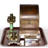 Gilt tooled brown leather desk top correspondence box, with green silk interior, by J C Vickery,