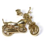 A 9 carat gold motorbike pendant 21.22g gross