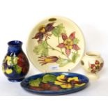 Walter Moorcroft: Hibiscus pattern oval dish and baluster vase, together with a Columbine plate