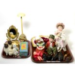 A bisque sleigh, bisque figure of seated girl, a pair of Heubach figures, two wall panels, dolls