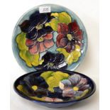 A Walter Moorcroft Clematis pattern bowl and plate (2)