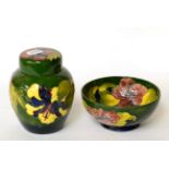 A Walter Moorcroft Hibiscus patter ginger jar and cover and similar bowl