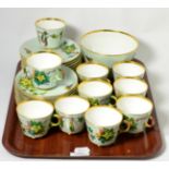 A 19th Century Davenport Longport part tea service, handpainted ivy and butterfly design on green