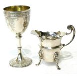 A Victorian silver goblet, William Smily, London 1865, with bead borders; and a silver cream jug