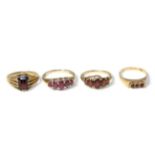 A 9 carat gold ruby ring and three 9 carat gold garnet rings (4) Ruby ring - Finger size U, 3.44g