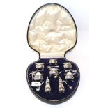 A silver eight piece cruet set, E S Barnsley, Birmingham 1945, in a fitted case, 9.8ozt