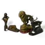 After Walton, a bronzed figure of a lion; with three others (4)