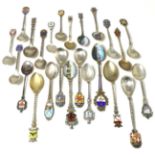A quantity of Continental silver and white metal souvenir spoons, mostly European cities, the