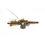 A pearl and diamond shamrock brooch, with old cut diamond set leaves and a central pearl, to a