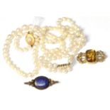 Two cultured pearl necklaces, a citrine brooch and a lapis lazuli brooch (4)