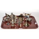 A group of silver to include a Victorian octagonal mug; sauceboat; dwarf candlesticks; cream jug;