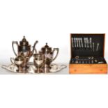 A Canteen of Community plate cutlery and four piece silver plated tea service on tray