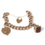 A bracelet with 9 carat gold clasp medallion and seal 47.22g gross