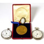 A silver cased pocket watch and a 1902 medal etc