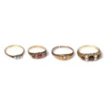 A 9 carat gold garnet and pearl ring, a 9 carat gold ruby and diamond ring and two diamond rings (4)