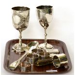 Two silver presentation goblets, silver tablespoon, five silver napkin rings, two silver vesta cases
